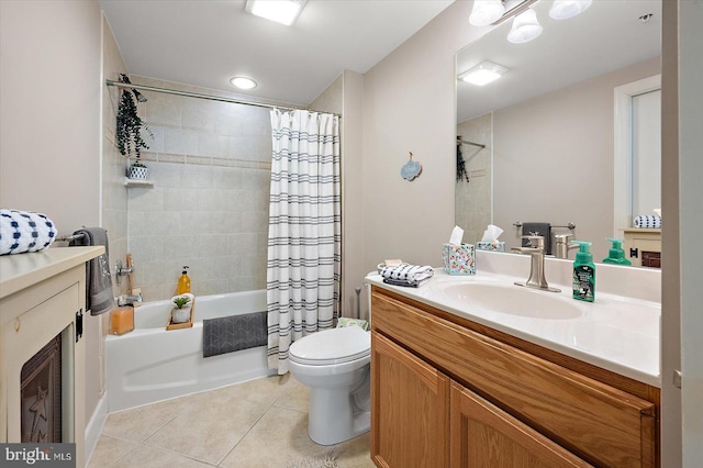 full bathroom featuring shower / tub combo with curtain, vanity, toilet, and tile patterned flooring