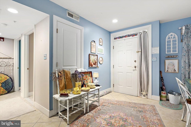 view of tiled entrance foyer