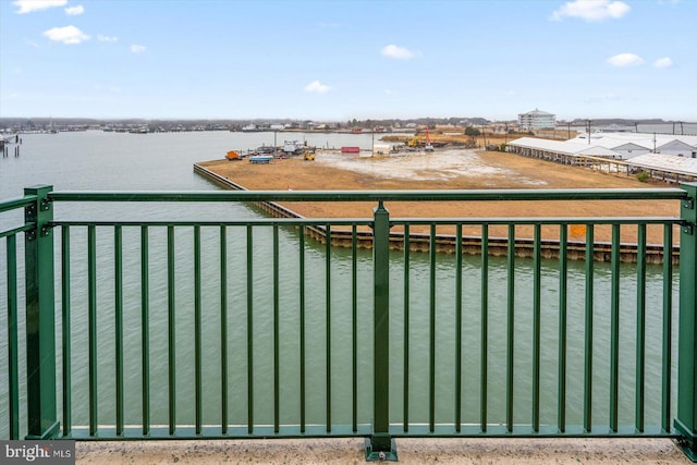 balcony featuring a water view