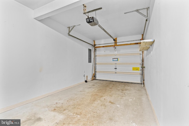 garage with a garage door opener and electric panel