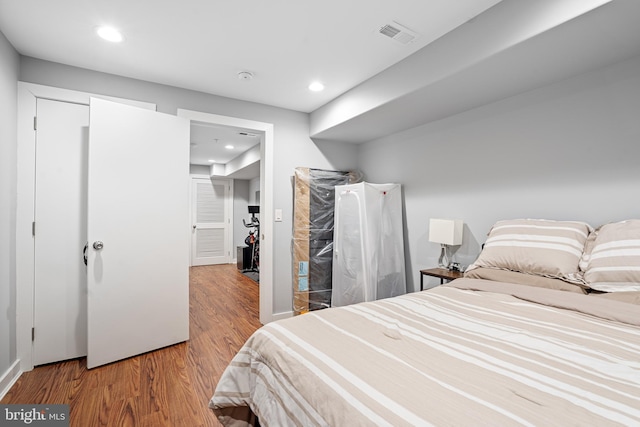 bedroom featuring light hardwood / wood-style flooring