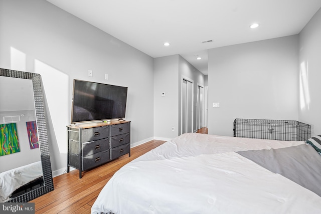 bedroom featuring light hardwood / wood-style flooring