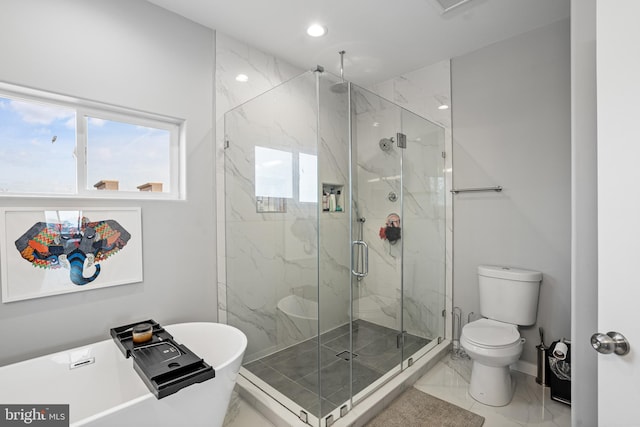 bathroom featuring plus walk in shower and toilet