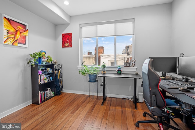 office space with hardwood / wood-style flooring