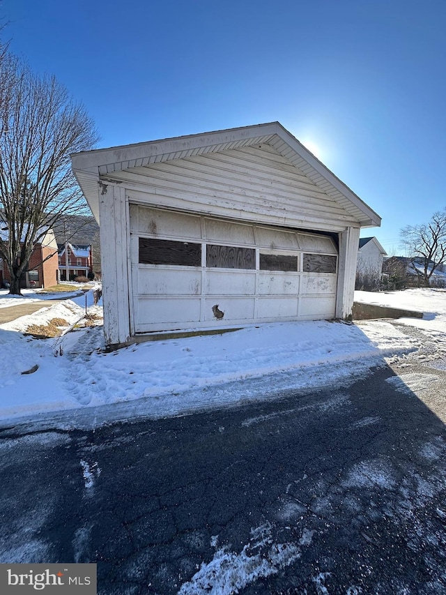 view of snow covered garage