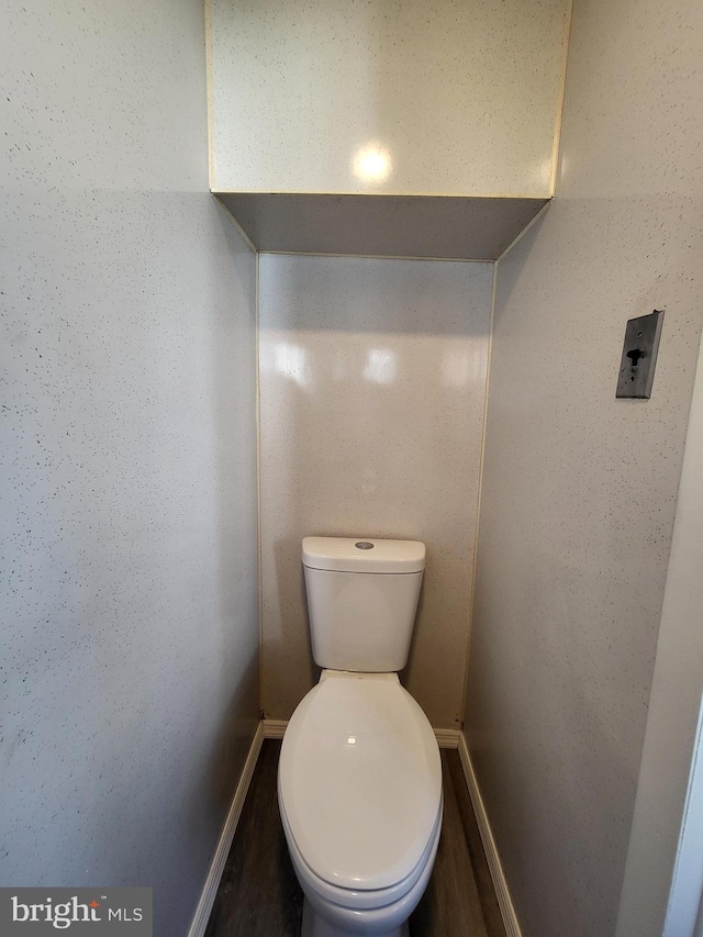 bathroom featuring toilet