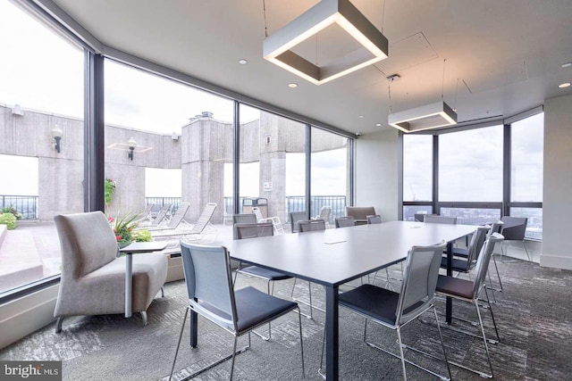 dining area with a wall of windows