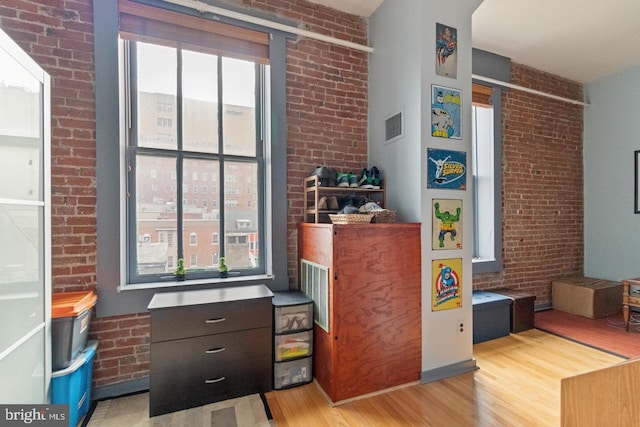 1010 Race St Unit 5D, Philadelphia, PA 19107 - interior space featuring brick wall and light wood-type flooring