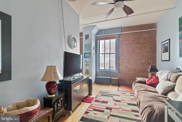 1010 Race St Unit 5D, Philadelphia, PA 19107 - living room with ceiling fan, brick wall, and light wood-type flooring