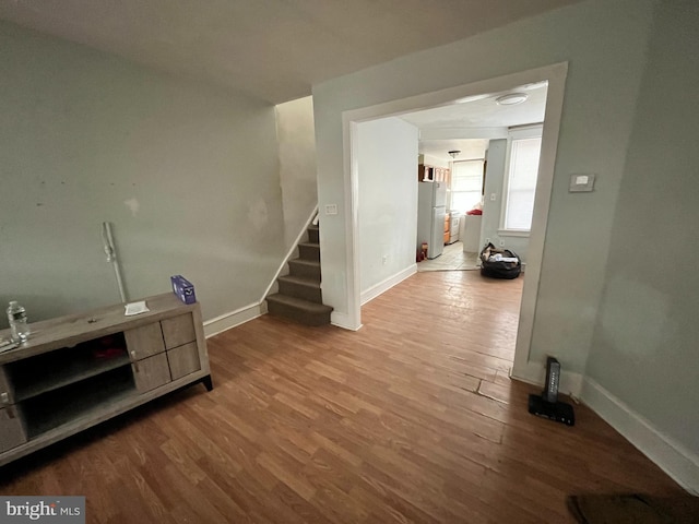 hallway featuring hardwood / wood-style flooring