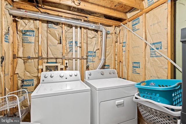 laundry area featuring laundry area and washer and clothes dryer