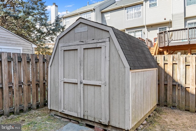 view of shed featuring a fenced backyard