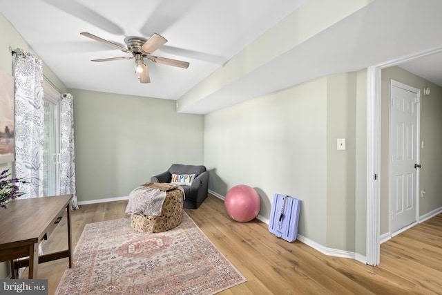 sitting room featuring wood finished floors and baseboards