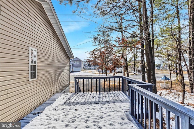 view of snow covered deck