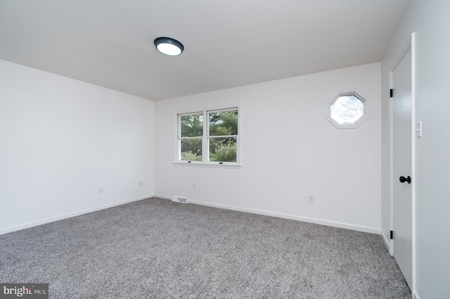 view of carpeted spare room