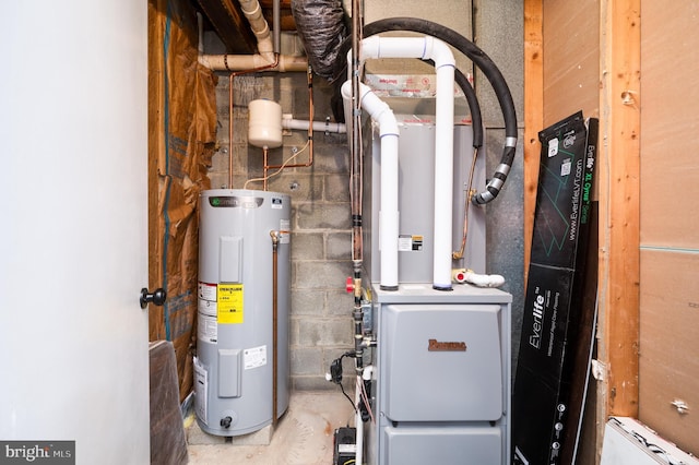 utility room featuring water heater