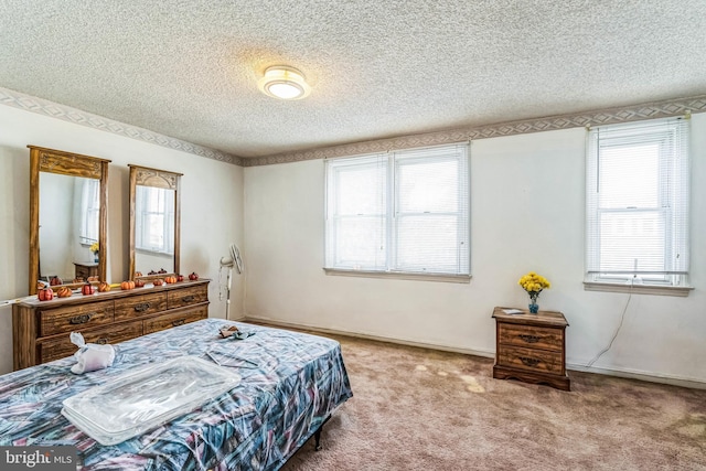 carpeted bedroom with a textured ceiling