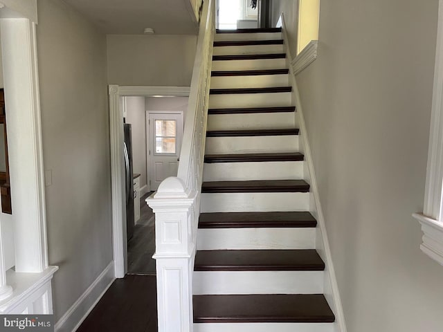 stairway with wood-type flooring