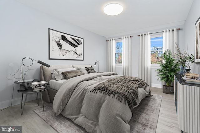 bedroom featuring baseboards