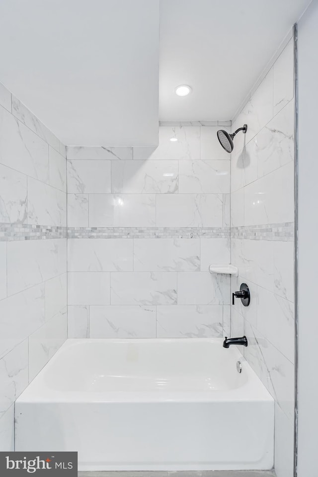 bathroom featuring shower / bath combination and recessed lighting