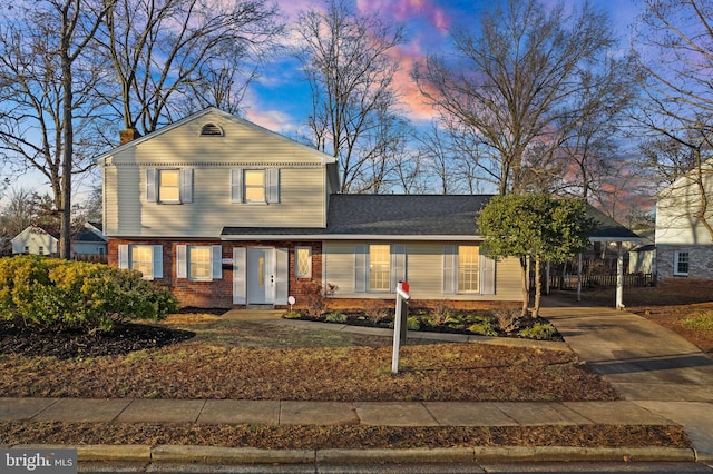 view of front facade with a carport