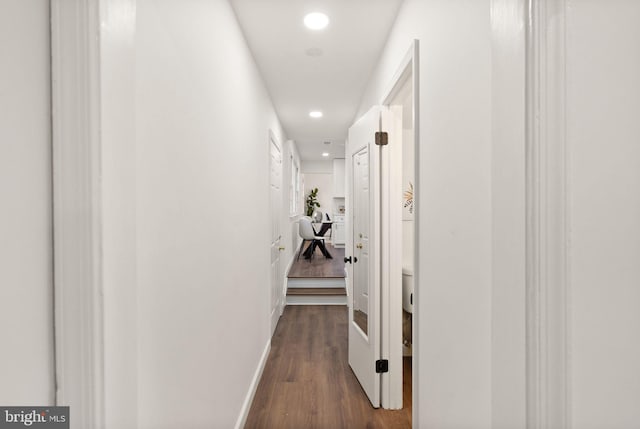 hallway featuring dark hardwood / wood-style floors