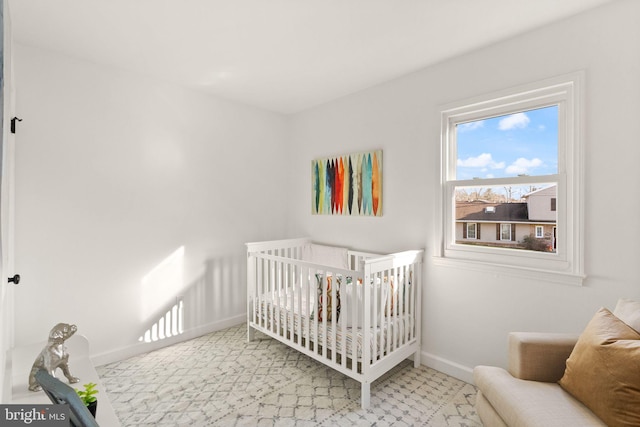 bedroom featuring a crib