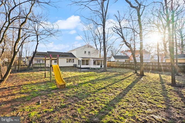 view of yard featuring a sunroom