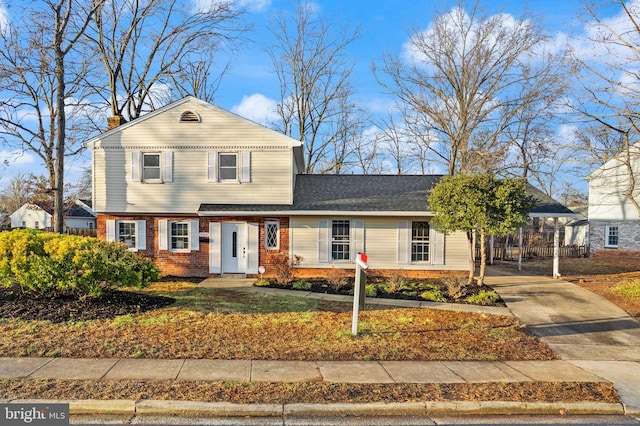 view of front of property with a carport