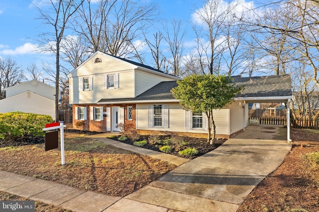 view of front of home with a carport