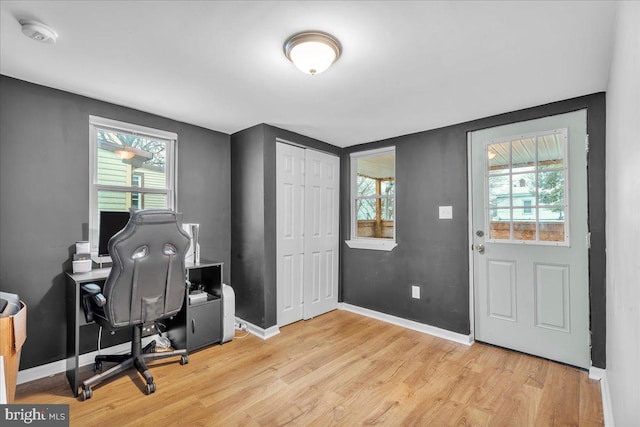 home office featuring light wood-type flooring