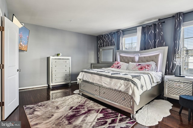 bedroom featuring dark hardwood / wood-style floors