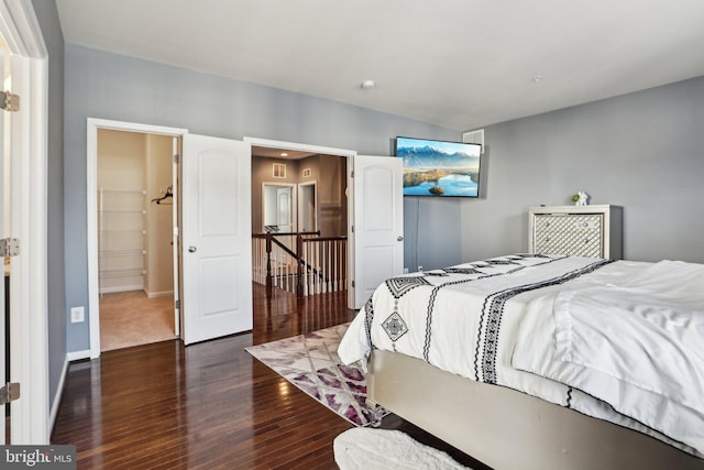 bedroom featuring dark hardwood / wood-style floors