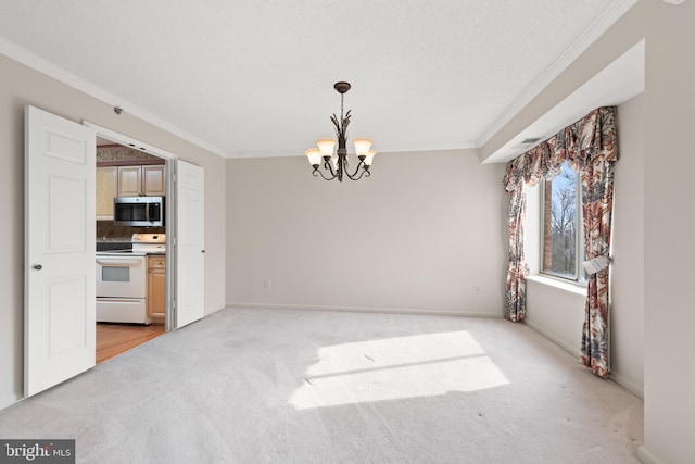 unfurnished dining area with an inviting chandelier, light colored carpet, ornamental molding, and a textured ceiling