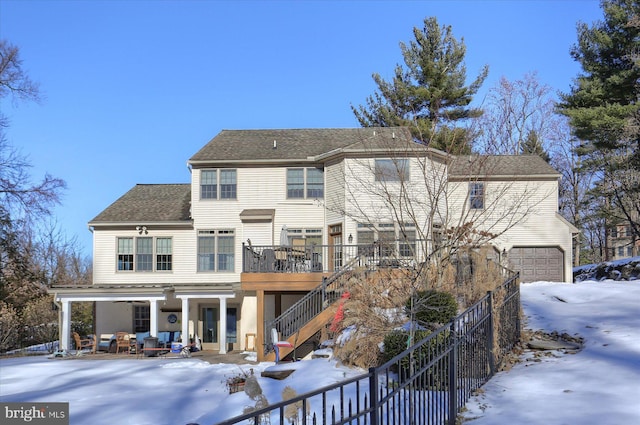 exterior space with a garage and a porch