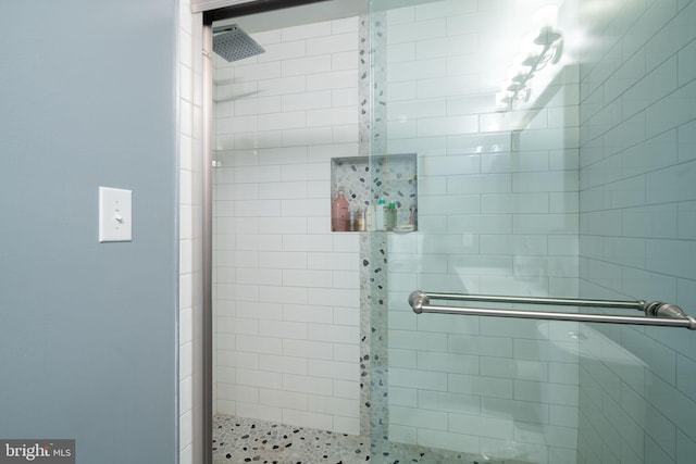 bathroom featuring a shower stall