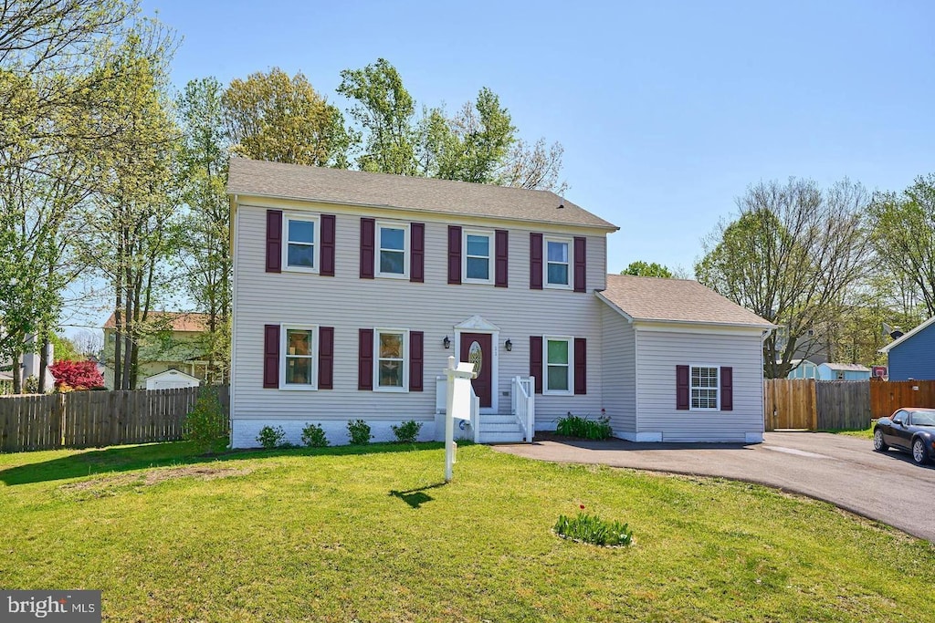 colonial house with a front yard