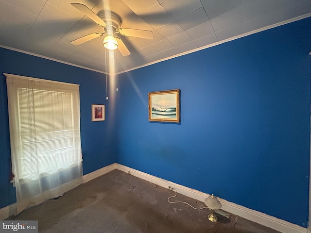 interior space with crown molding, carpet floors, and ceiling fan