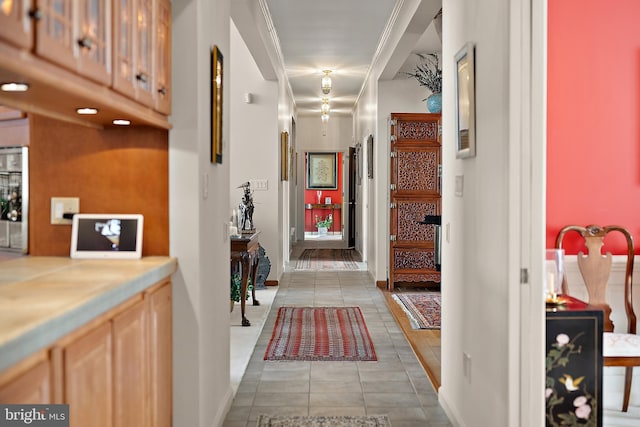 corridor featuring light tile patterned floors