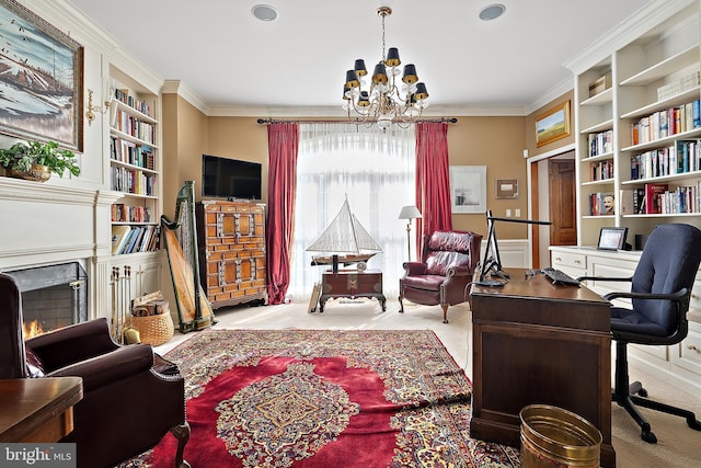 carpeted home office with crown molding, a chandelier, and built in features