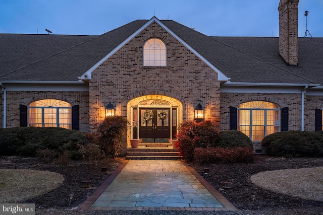 doorway to property featuring french doors