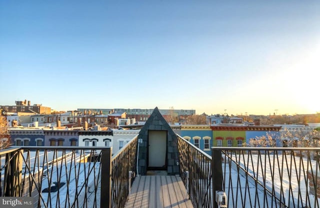 view of balcony at dusk