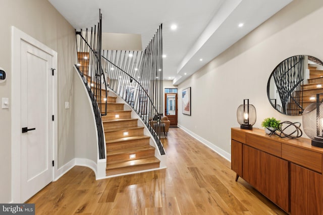 entryway with light hardwood / wood-style flooring