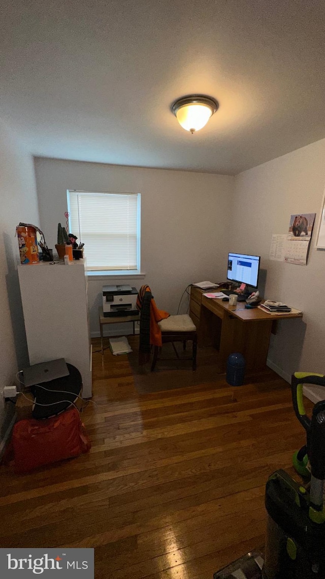 office area featuring dark wood-type flooring