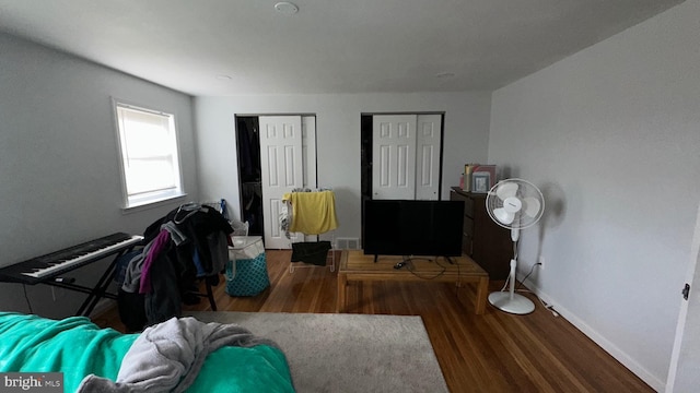 interior space with dark wood-type flooring