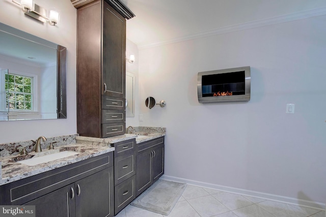 bathroom with vanity, tile patterned floors, and ornamental molding