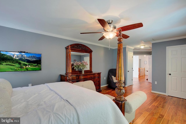 bedroom with ornamental molding, light hardwood / wood-style floors, and ceiling fan