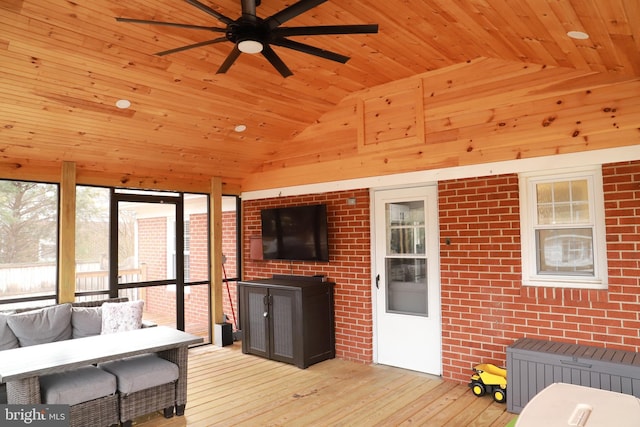 living room featuring vaulted ceiling, radiator, wood ceiling, and light hardwood / wood-style flooring