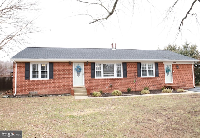 ranch-style home with a front yard