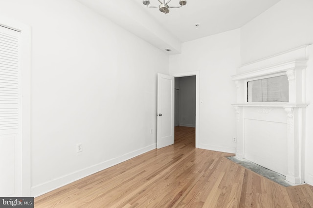 unfurnished bedroom featuring light wood-type flooring